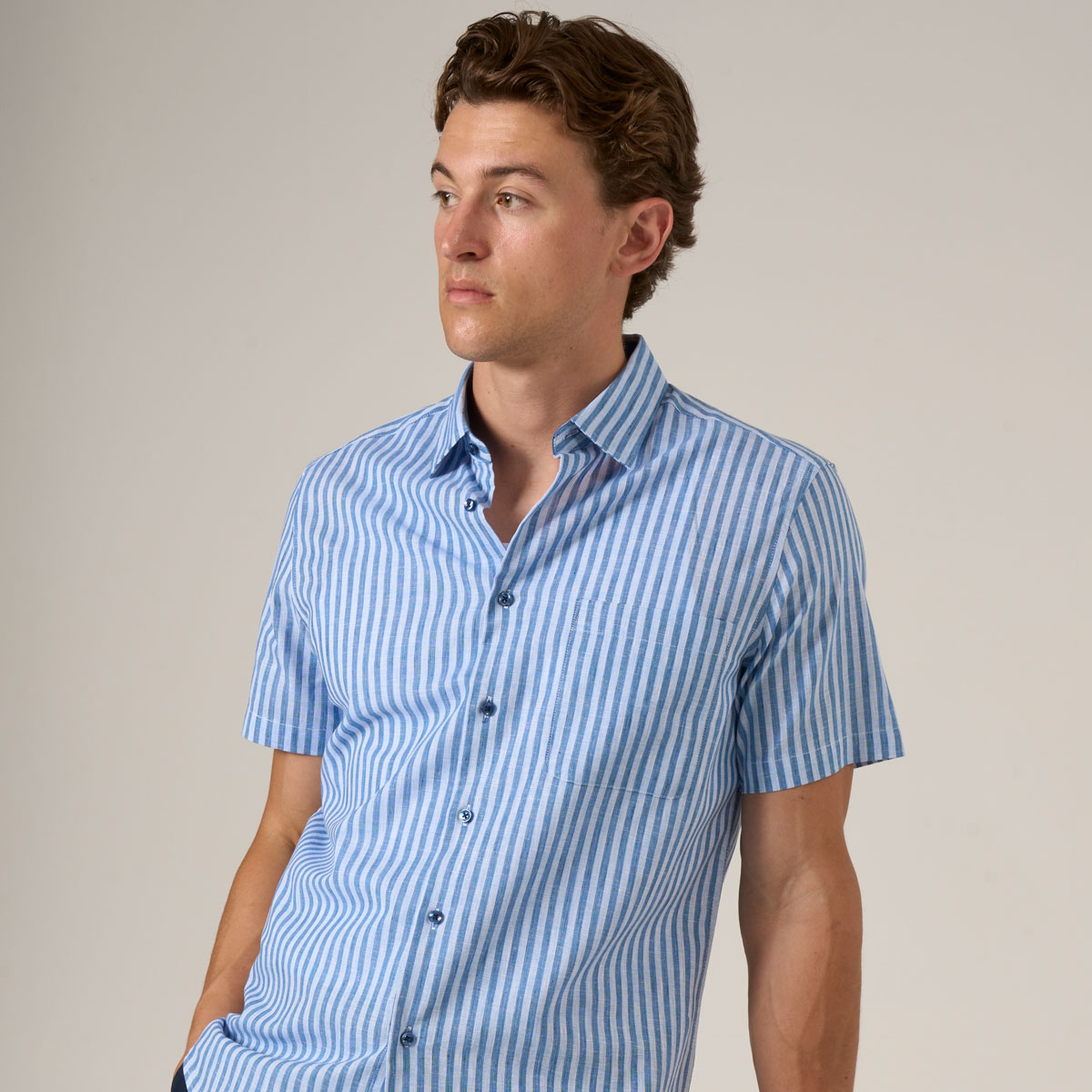 Mens-Blue-Stripe-Cotton-Linen-Blend-Short-sleeve-shirt-THLB002 Mens Blue Stripe Cotton Linen Blend Short sleeve shirt with blue contrast buttons. Relaxed Fit.